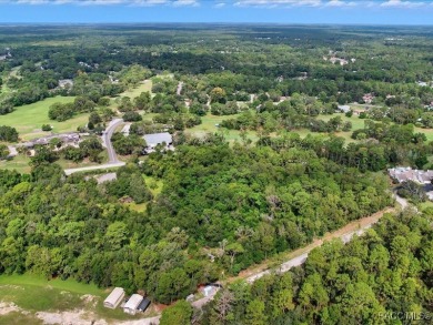 Prime Commercial Land - 7.09 Acres in Sugarmill Woods on Sugarmill Woods Golf and Country Club in Florida - for sale on GolfHomes.com, golf home, golf lot