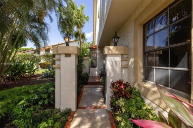 Beautifully upgraded end-unit townhome with stunning lake and on Boca Pointe Country Club in Florida - for sale on GolfHomes.com, golf home, golf lot