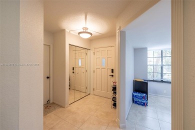 Beautifully upgraded end-unit townhome with stunning lake and on Boca Pointe Country Club in Florida - for sale on GolfHomes.com, golf home, golf lot