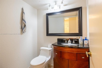 Beautifully upgraded end-unit townhome with stunning lake and on Boca Pointe Country Club in Florida - for sale on GolfHomes.com, golf home, golf lot