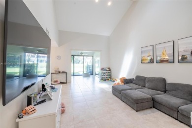 Beautifully upgraded end-unit townhome with stunning lake and on Boca Pointe Country Club in Florida - for sale on GolfHomes.com, golf home, golf lot