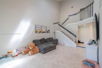 Beautifully upgraded end-unit townhome with stunning lake and on Boca Pointe Country Club in Florida - for sale on GolfHomes.com, golf home, golf lot