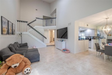 Beautifully upgraded end-unit townhome with stunning lake and on Boca Pointe Country Club in Florida - for sale on GolfHomes.com, golf home, golf lot