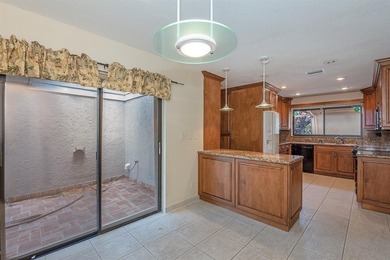 Located in a Gated Community, this well-appointed Villa offers a on The Club at Emerald Hills in Florida - for sale on GolfHomes.com, golf home, golf lot