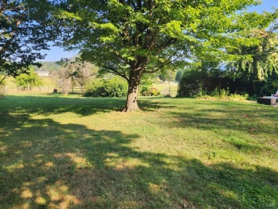 Quaint brick ranch with picturesque views of Bedford Country on Bedford Country Club in Virginia - for sale on GolfHomes.com, golf home, golf lot