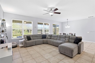 Experience relaxed, modern Florida living in this beautifully on Providence Golf Club in Florida - for sale on GolfHomes.com, golf home, golf lot