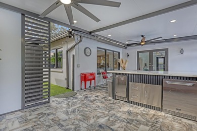 Welcome home to your resort-caliber sanctuary crafted for on Palm Beach National Golf and Country Club in Florida - for sale on GolfHomes.com, golf home, golf lot