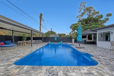 Welcome home to your resort-caliber sanctuary crafted for on Palm Beach National Golf and Country Club in Florida - for sale on GolfHomes.com, golf home, golf lot