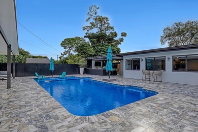 Welcome home to your resort-caliber sanctuary crafted for on Palm Beach National Golf and Country Club in Florida - for sale on GolfHomes.com, golf home, golf lot