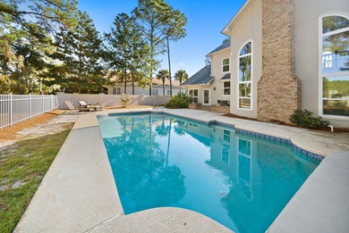 Welcome to 1155 Troon Drive N., a stunning home nestled in the on Sandestin Golf and Beach Resort - Raven in Florida - for sale on GolfHomes.com, golf home, golf lot