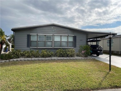 This expansive home has a special place for all of your needs on Indianwood Golf and Country Club in Florida - for sale on GolfHomes.com, golf home, golf lot