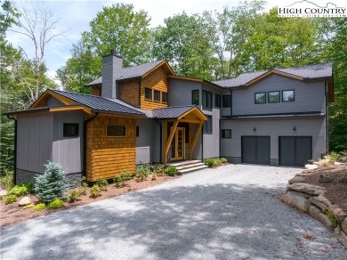 This custom built exquisite mountain modern home is one of a on Elk River Club in North Carolina - for sale on GolfHomes.com, golf home, golf lot