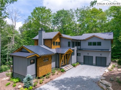 This custom built exquisite mountain modern home is one of a on Elk River Club in North Carolina - for sale on GolfHomes.com, golf home, golf lot