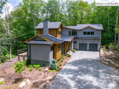 This custom built exquisite mountain modern home is one of a on Elk River Club in North Carolina - for sale on GolfHomes.com, golf home, golf lot