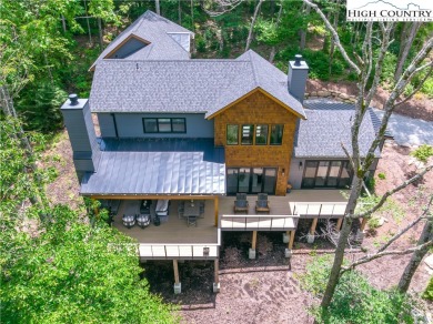 This custom built exquisite mountain modern home is one of a on Elk River Club in North Carolina - for sale on GolfHomes.com, golf home, golf lot