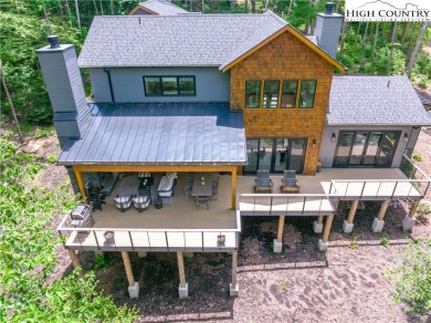 This custom built exquisite mountain modern home is one of a on Elk River Club in North Carolina - for sale on GolfHomes.com, golf home, golf lot