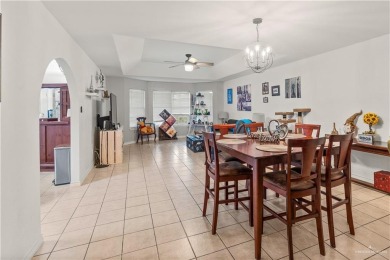 Spacious 3-bed, 3-bath home with two master suites--perfect for on Harlingen Country Club in Texas - for sale on GolfHomes.com, golf home, golf lot