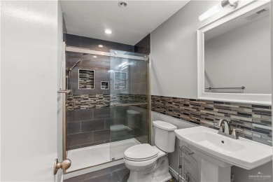 Spacious 3-bed, 3-bath home with two master suites--perfect for on Harlingen Country Club in Texas - for sale on GolfHomes.com, golf home, golf lot