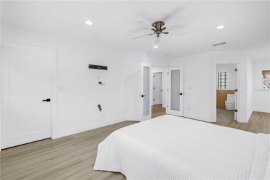 5-bedroom, 3-bathroom Mid-Century home in desirable Dunedin on The Dunedin Country Club in Florida - for sale on GolfHomes.com, golf home, golf lot