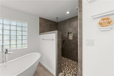 Spacious 3-bed, 3-bath home with two master suites--perfect for on Harlingen Country Club in Texas - for sale on GolfHomes.com, golf home, golf lot