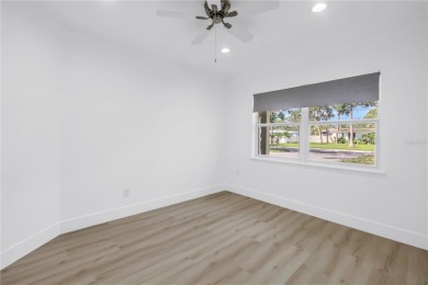 5-bedroom, 3-bathroom Mid-Century home in desirable Dunedin on The Dunedin Country Club in Florida - for sale on GolfHomes.com, golf home, golf lot