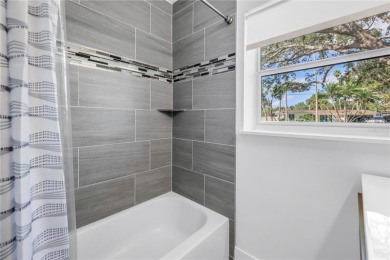 5-bedroom, 3-bathroom Mid-Century home in desirable Dunedin on The Dunedin Country Club in Florida - for sale on GolfHomes.com, golf home, golf lot