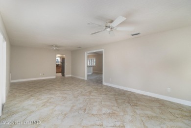 Nestled within a sought-after resort-style country club on Indian River Colony Club in Florida - for sale on GolfHomes.com, golf home, golf lot