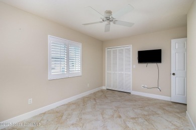 Nestled within a sought-after resort-style country club on Indian River Colony Club in Florida - for sale on GolfHomes.com, golf home, golf lot