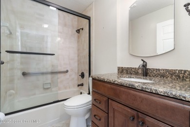 Nestled within a sought-after resort-style country club on Indian River Colony Club in Florida - for sale on GolfHomes.com, golf home, golf lot