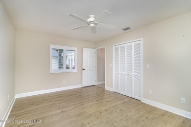 Nestled within a sought-after resort-style country club on Indian River Colony Club in Florida - for sale on GolfHomes.com, golf home, golf lot