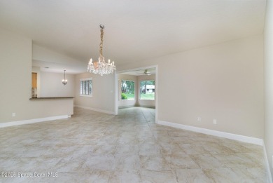 Nestled within a sought-after resort-style country club on Indian River Colony Club in Florida - for sale on GolfHomes.com, golf home, golf lot