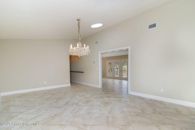 Nestled within a sought-after resort-style country club on Indian River Colony Club in Florida - for sale on GolfHomes.com, golf home, golf lot