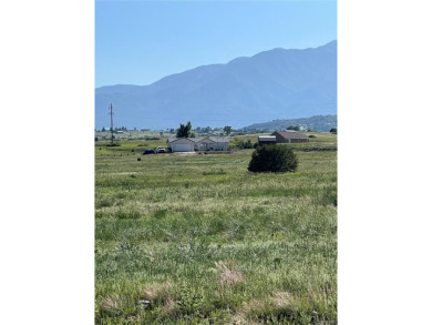This property is one of over 140 individual lots being sold on Hollydot Golf Course in Colorado - for sale on GolfHomes.com, golf home, golf lot
