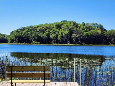 This South-facing lake lot is situated on Upper Waterman, the on Cumberland Golf Club in Wisconsin - for sale on GolfHomes.com, golf home, golf lot