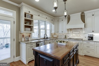 Nestled within the prestigious Chattahoochee River Club, this on Sugar Hill Golf Club in Georgia - for sale on GolfHomes.com, golf home, golf lot