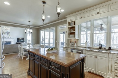 Nestled within the prestigious Chattahoochee River Club, this on Sugar Hill Golf Club in Georgia - for sale on GolfHomes.com, golf home, golf lot