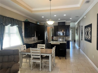 PRICE JUST REDUCED! Welcome to an impeccably maintained modern on Babe Zaharias Golf Course in Florida - for sale on GolfHomes.com, golf home, golf lot