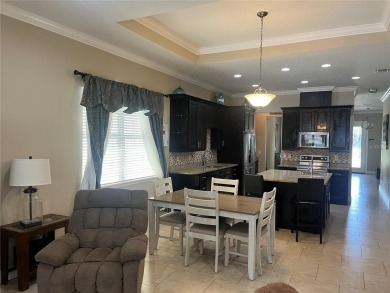 PRICE JUST REDUCED! Welcome to an impeccably maintained modern on Babe Zaharias Golf Course in Florida - for sale on GolfHomes.com, golf home, golf lot