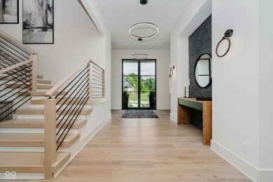 Step into luxury in this stunning Carrington Homes custom estate on Chatham Hills Golf Course in Indiana - for sale on GolfHomes.com, golf home, golf lot