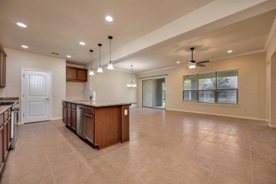 This beautifully maintained corner lot half duplex home is on Wildhorse Golf Club of Robson Ranch in Texas - for sale on GolfHomes.com, golf home, golf lot