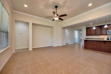 This beautifully maintained corner lot half duplex home is on Wildhorse Golf Club of Robson Ranch in Texas - for sale on GolfHomes.com, golf home, golf lot