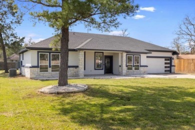 Step inside this 4 bedroom, 2 bath, with an office/flex room on Pine Forest Golf Club in Texas - for sale on GolfHomes.com, golf home, golf lot