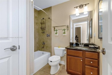 This impeccable two bedroom, two bathroom apartment offers a on Carrollwood Country Club in Florida - for sale on GolfHomes.com, golf home, golf lot