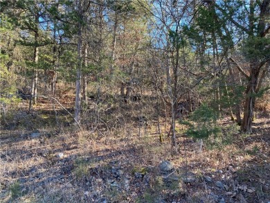 A perfect slightly uphill lot on a quiet street that is just a on Holiday Island Executive Golf Course in Arkansas - for sale on GolfHomes.com, golf home, golf lot