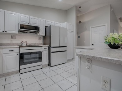 Nestled in the heart of The Villages, within the charming on The Links of Spruce Creek in Florida - for sale on GolfHomes.com, golf home, golf lot