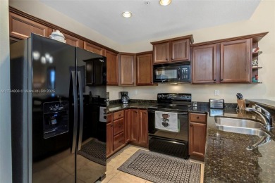 This impeccable two bedroom, two bathroom apartment offers a on Carrollwood Country Club in Florida - for sale on GolfHomes.com, golf home, golf lot