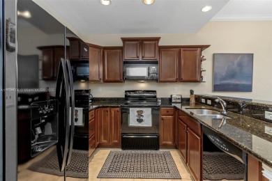 This impeccable two bedroom, two bathroom apartment offers a on Carrollwood Country Club in Florida - for sale on GolfHomes.com, golf home, golf lot