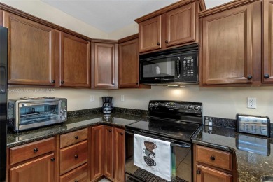 This impeccable two bedroom, two bathroom apartment offers a on Carrollwood Country Club in Florida - for sale on GolfHomes.com, golf home, golf lot