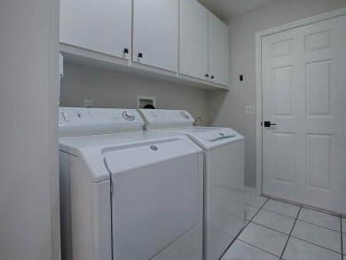Nestled in the heart of The Villages, within the charming on The Links of Spruce Creek in Florida - for sale on GolfHomes.com, golf home, golf lot
