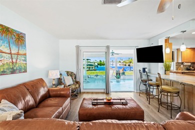 Experience the perfect blend of coastal charm and modern comfort on Gulf Harbors Golf Course in Florida - for sale on GolfHomes.com, golf home, golf lot